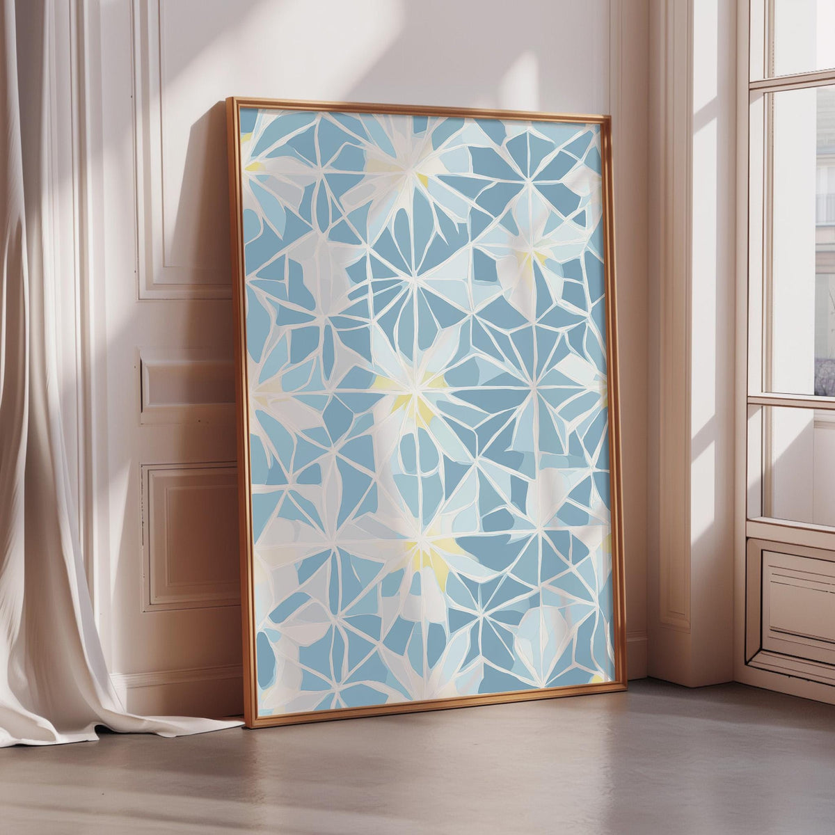 a large, framed artwork with a blue and white geometric pattern on a white wall.
