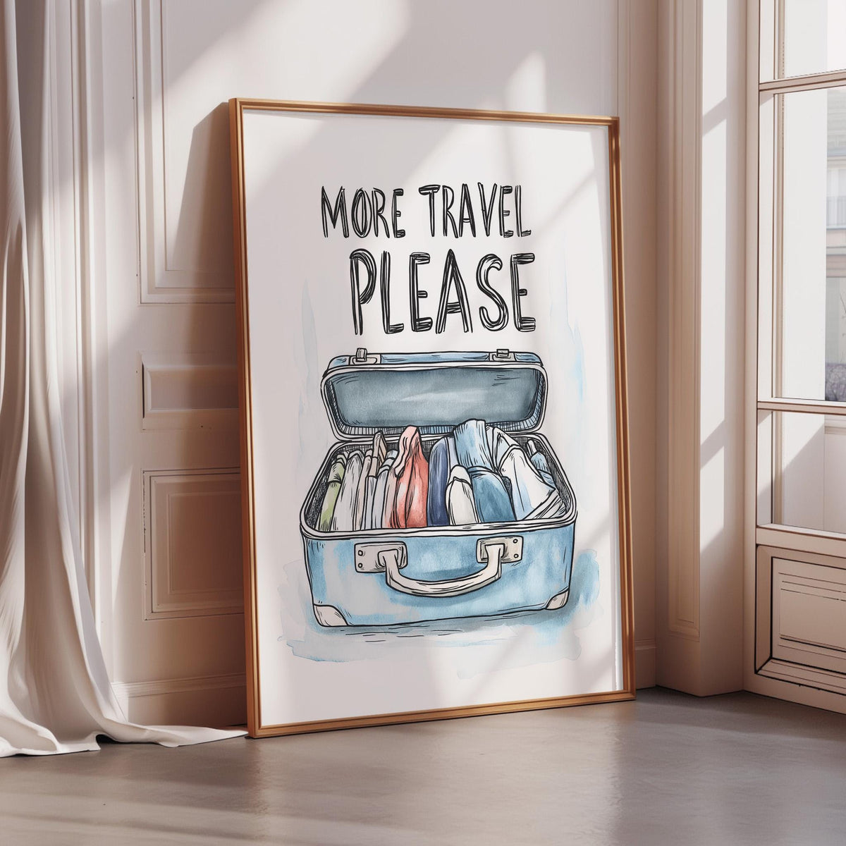 a framed poster with a watercolor illustration of an open suitcase, accompanied by the text "MORE TRAVEL PLEASE".