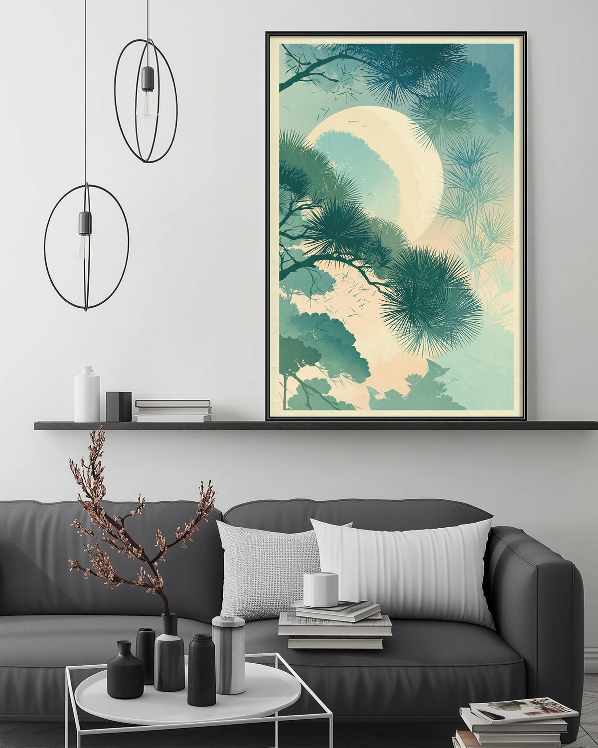 a modern living room with a gray sofa, a coffee table, and a large framed artwork depicting a serene landscape with a crescent moon and pine trees.