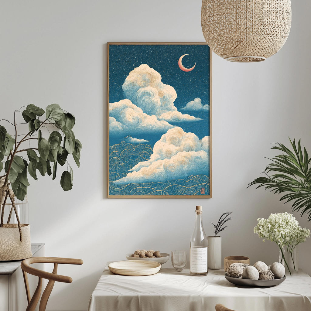 a serene indoor setting with a framed painting of a night sky with clouds hanging on the wall above a dining table. The table is set with various items, including a bottle, a bowl, and a vase with flowers. The room is decorated with potted plants and a woven light fixture, creating a calm and relaxing atmosphere.