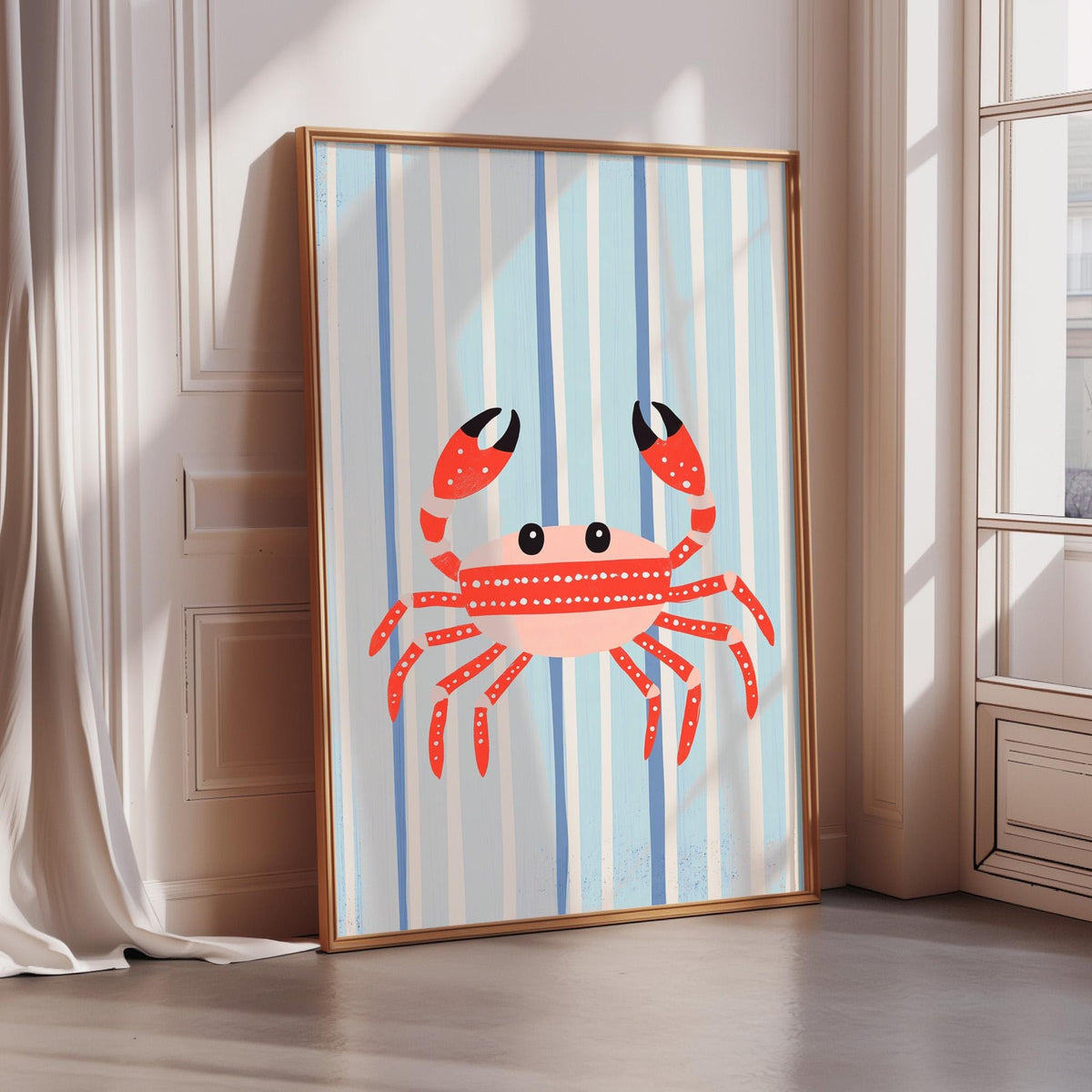 A framed illustration of a red crab with a blue and white striped background is displayed on a wall.
