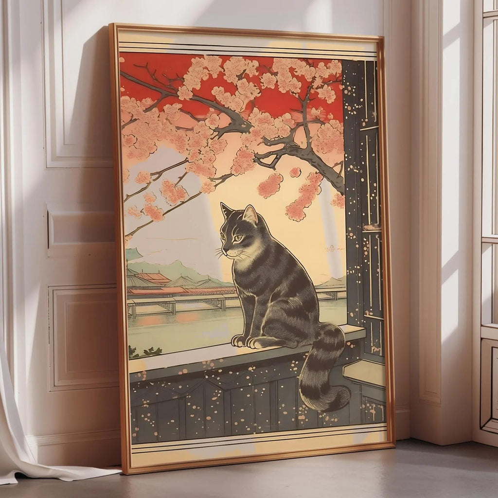 A framed illustration of a cat sitting on a windowsill, with a cherry blossom tree in the background.