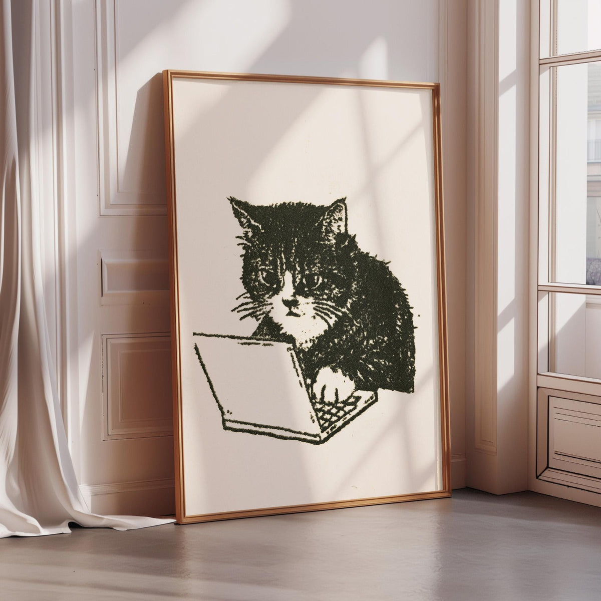 A framed image depicting a cat sitting on a laptop computer.