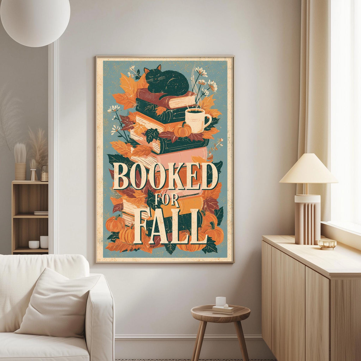a poster with a cat sitting on top of a stack of books, surrounded by autumn leaves and flowers, with the text "BOOKED FOR FALL" prominently displayed.
