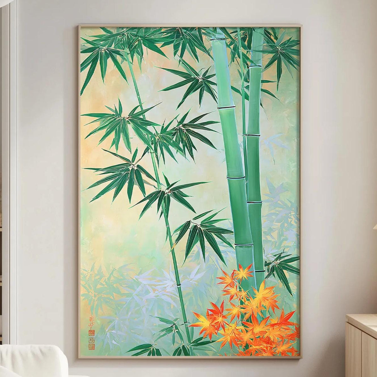 a living room with a large painting of bamboo plants and orange leaves hanging on the wall. The painting is framed in a wooden frame and is the focal point of the room. The room also includes a white sofa, a wooden side table, and a lamp on a wooden cabinet.