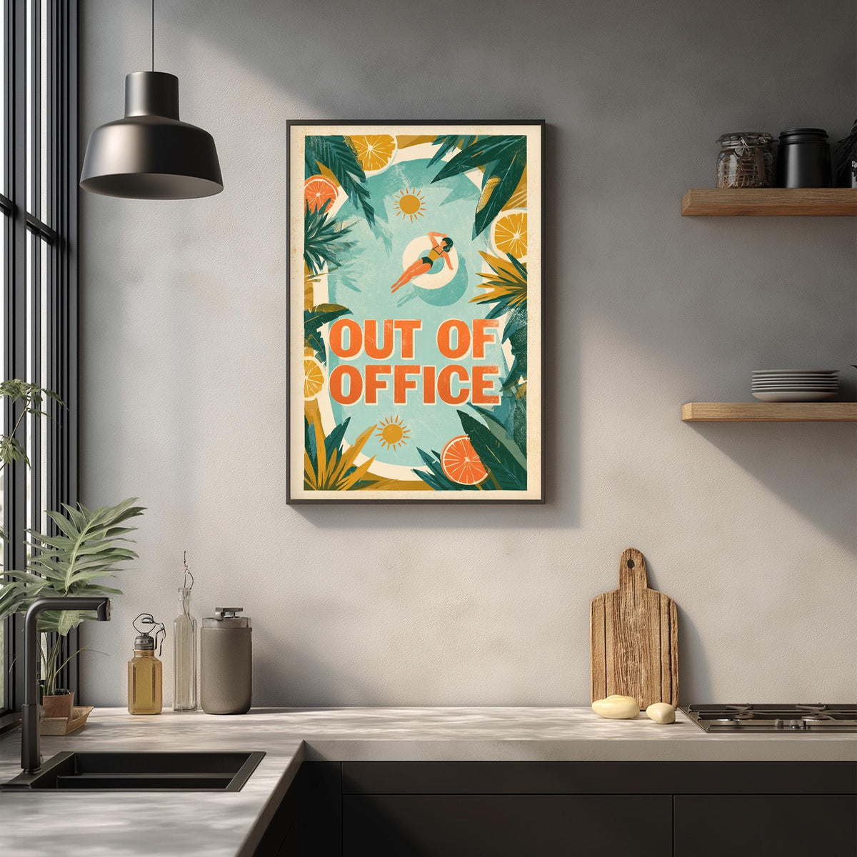 a kitchen counter with various kitchen items, such as a cutting board, a sink, and a bottle. Above the counter, there is a framed poster with the text "OUT OF OFFICE" and an illustration of a person lounging on a beach.