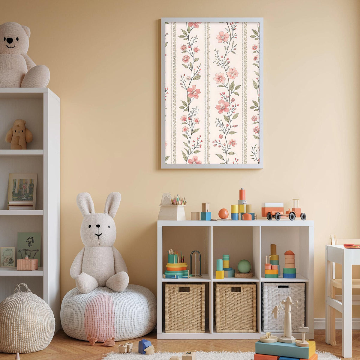 A cozy and well-organized children's playroom with a white bookshelf, a plush rabbit, and a toy train set. The room has a floral wallpaper and a framed picture on the wall, creating a warm and inviting atmosphere.
