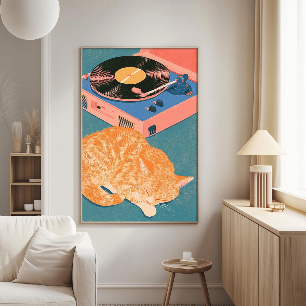 a cozy living room with a large framed illustration of a sleeping orange cat on a turquoise background, with a record player and turquoise record album in the background.