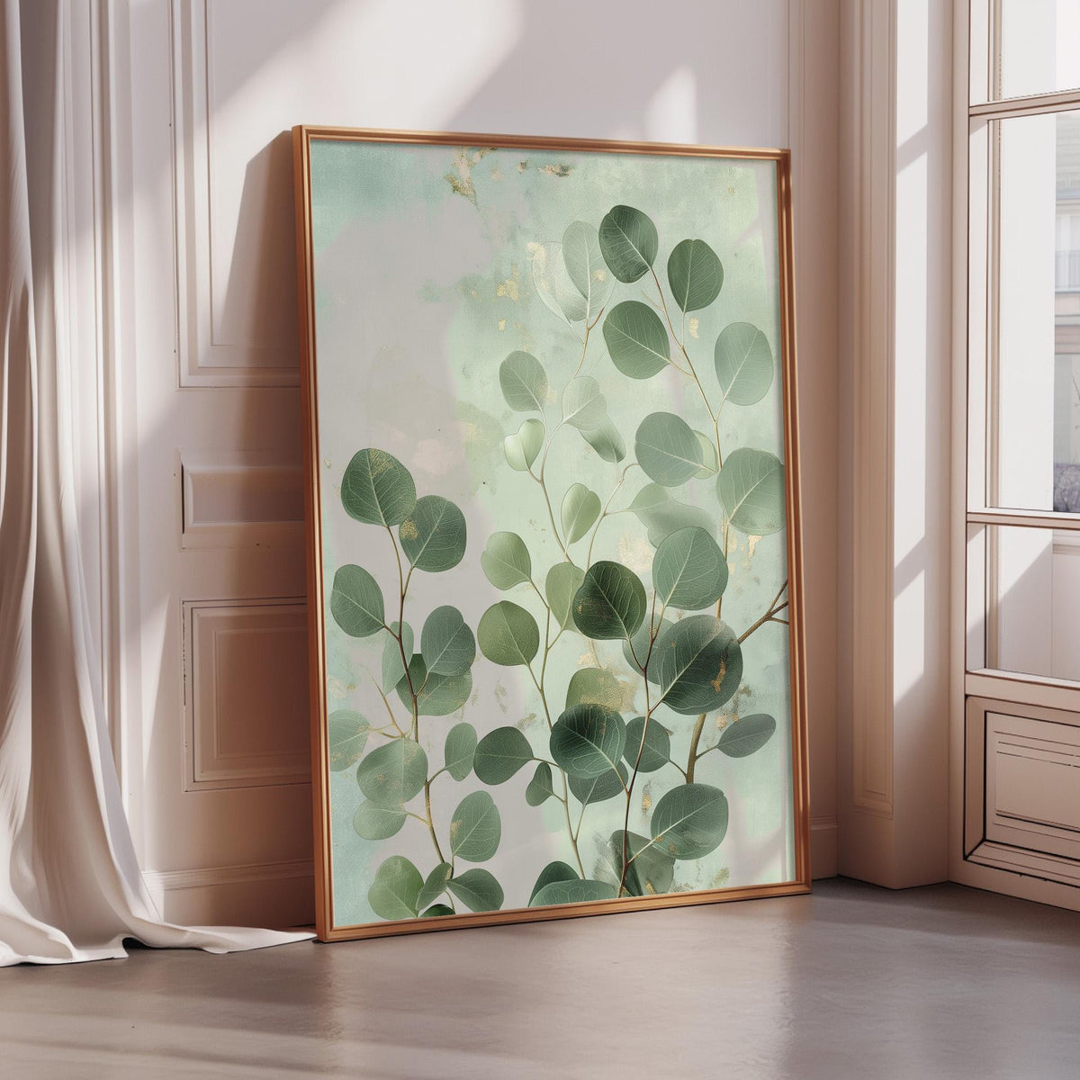 a large framed painting of green leaves on a wall, with a white frame and a light green background.