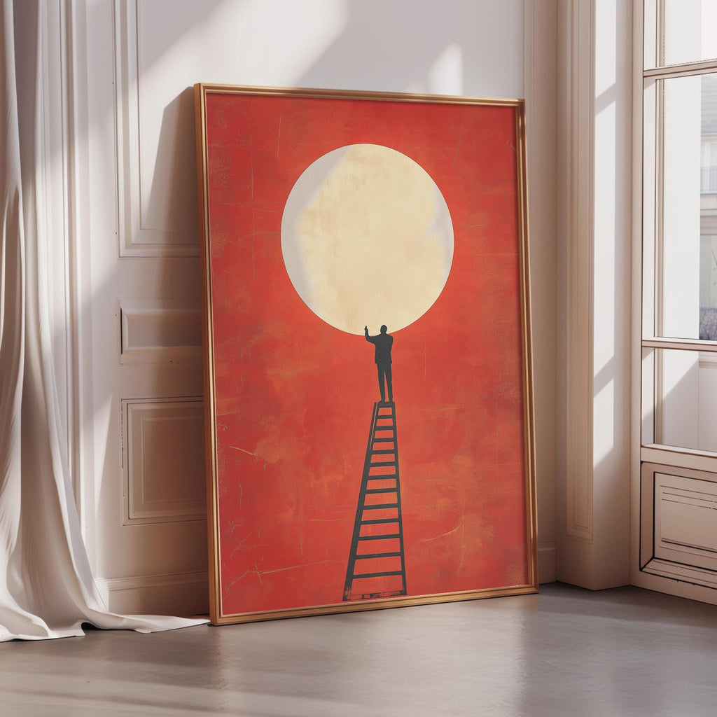 a large framed artwork depicting a person standing on a ladder, reaching up towards a large, bright yellow moon.