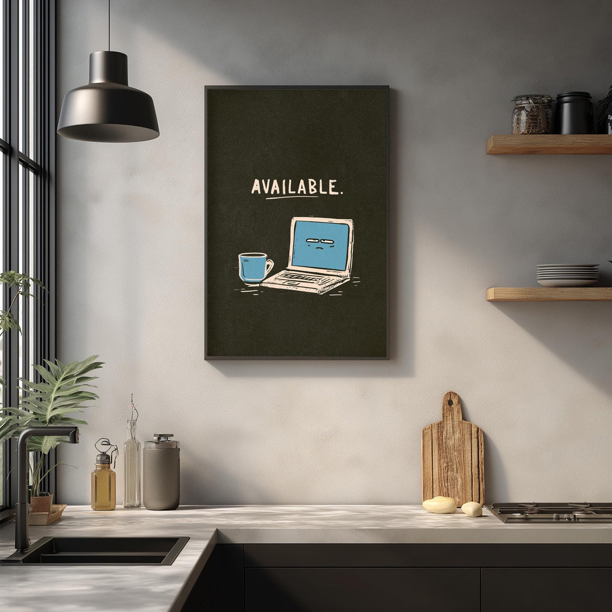 a kitchen counter with various items, including a laptop, a coffee mug, and a cutting board. Above the counter, there is a framed poster with the text "AVAILABLE."