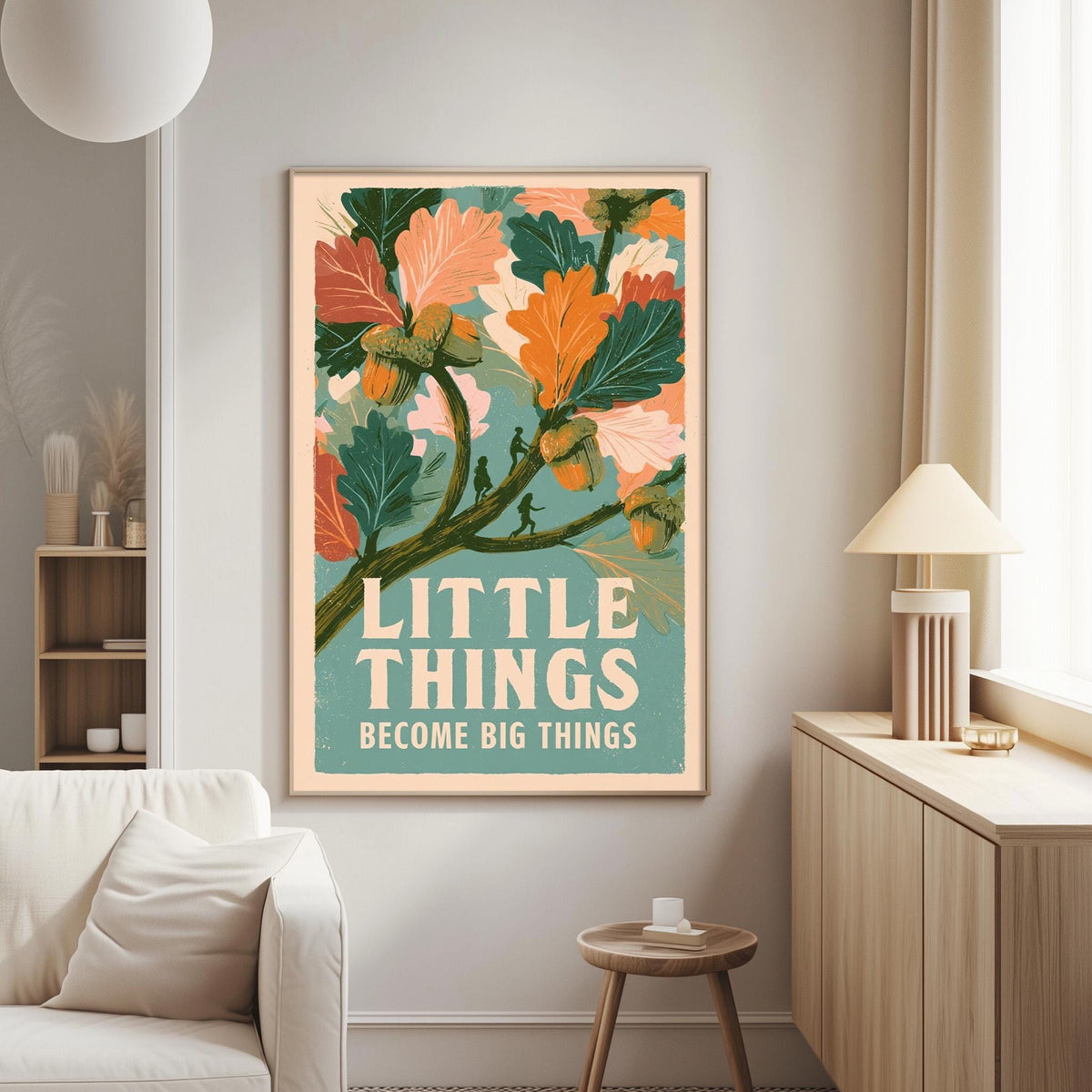 a framed poster with a vibrant, colorful illustration of leaves and flowers, along with the text "LITTLE THINGS BECOME BIG THINGS" displayed on the wall.