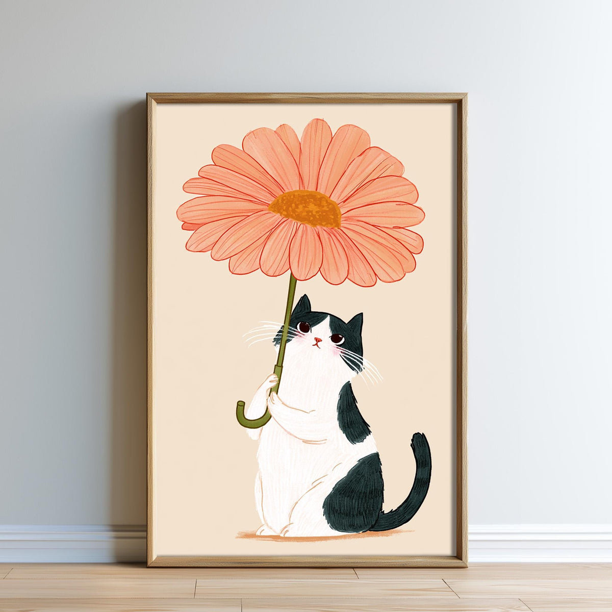 A framed illustration of a black and white cat sitting under a large orange flower.