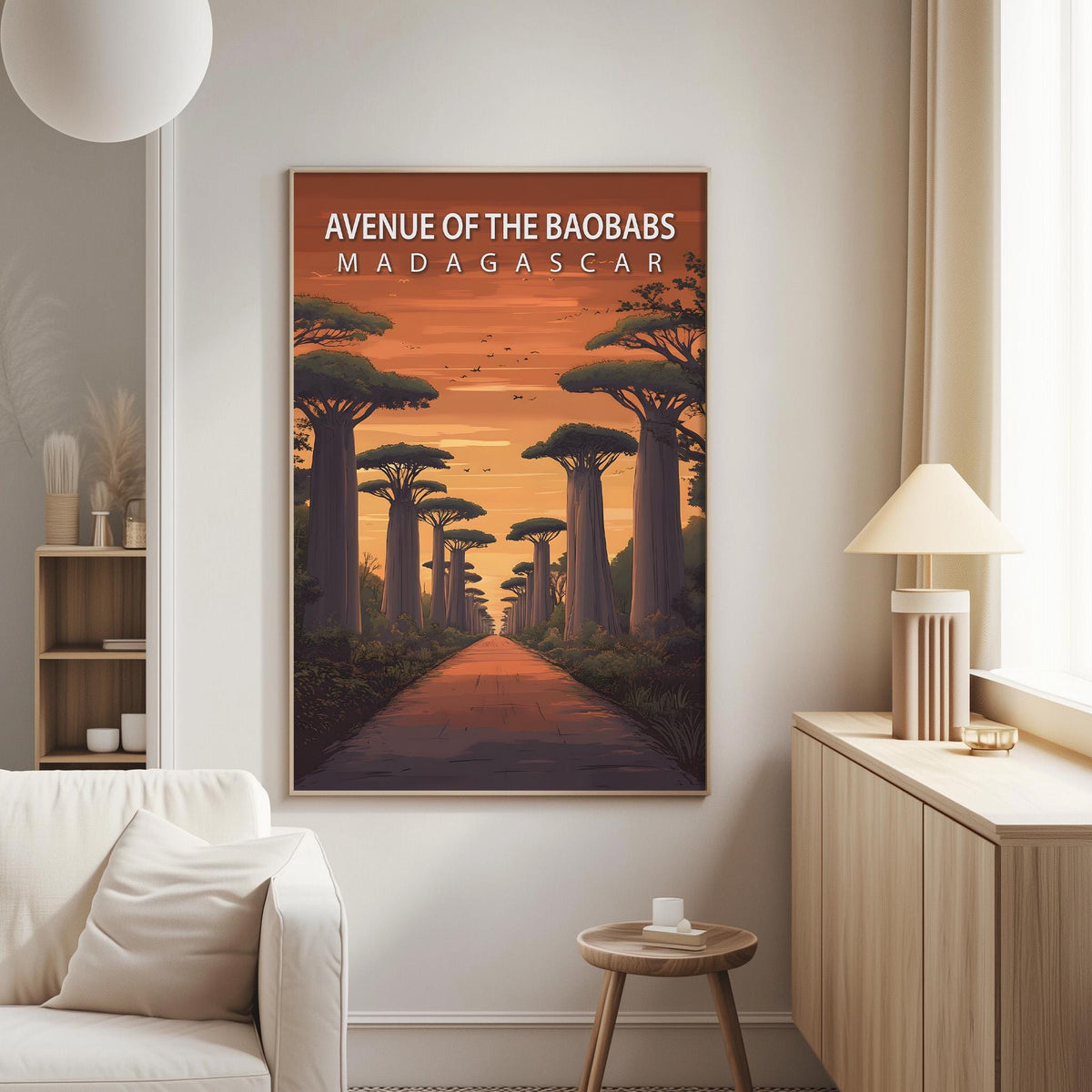a poster of a tropical forest scene with a path leading through it, hanging on a wall in a living room.