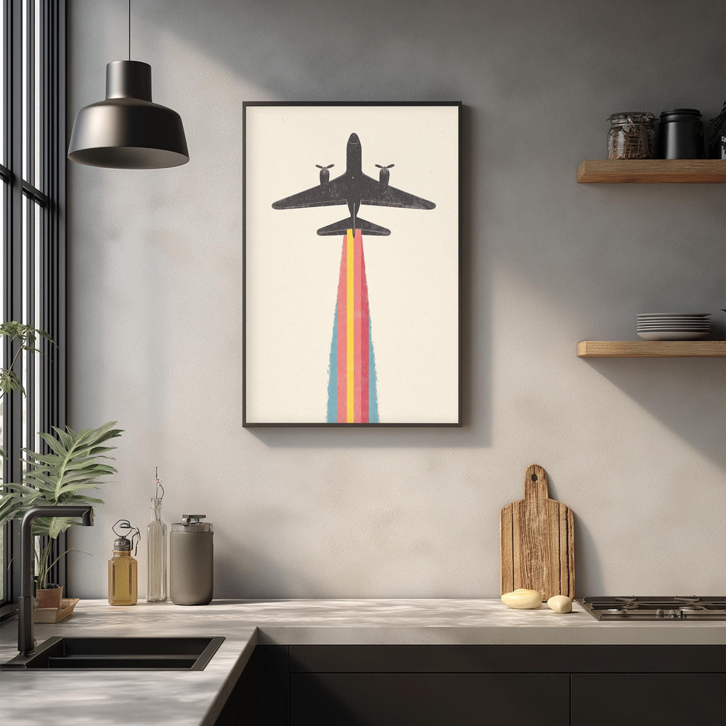 a kitchen counter with various kitchen items, including a cutting board, a knife, a bottle, and a plant. Above the counter, there is a framed picture of an airplane with a rainbow-colored smoke coming out of its tail.