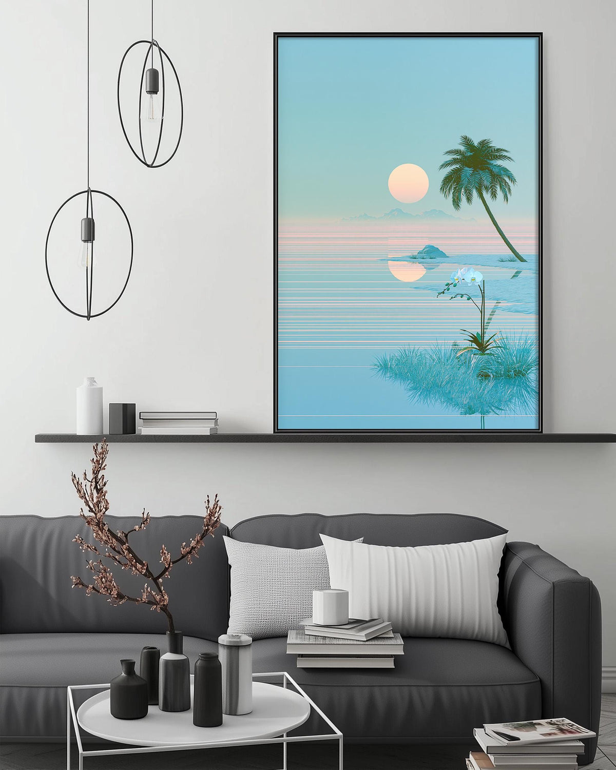 a living room with a gray sofa, a coffee table, and a large framed picture of a tropical beach scene hanging on the wall above the sofa.