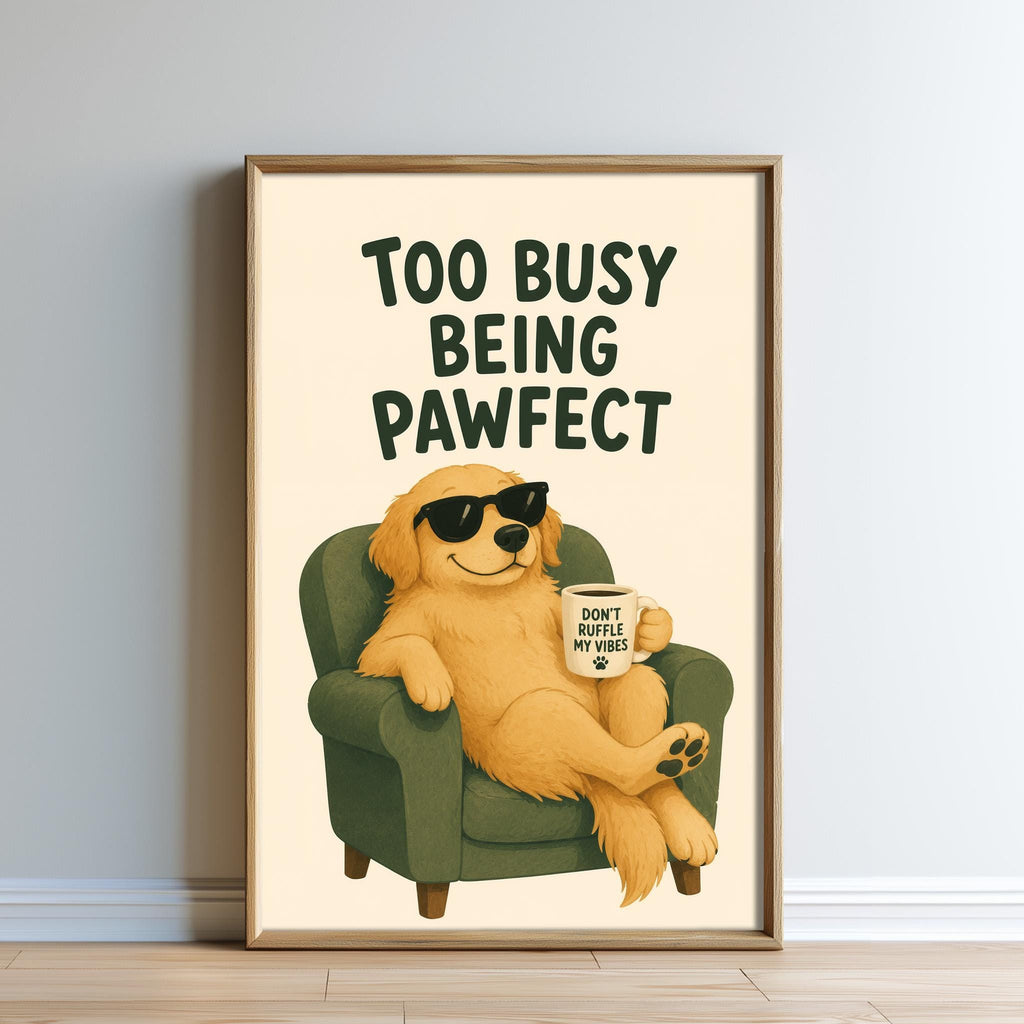 A framed poster featuring a cartoon dog wearing sunglasses and holding a coffee mug, with the text "Too busy being pawfect" written above it.