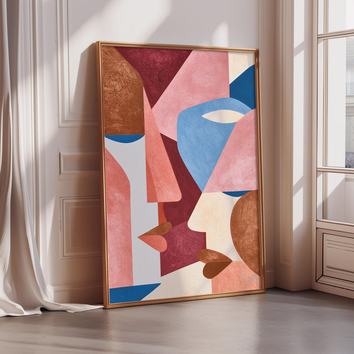 a large abstract painting with bold geometric shapes in various colors, including red, blue, and orange, displayed on a white wall.