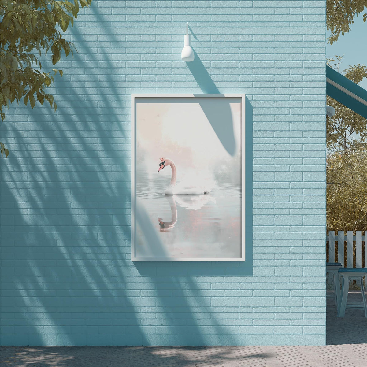 a large white picture frame hanging on a blue brick wall, depicting a swan swimming in a pond.