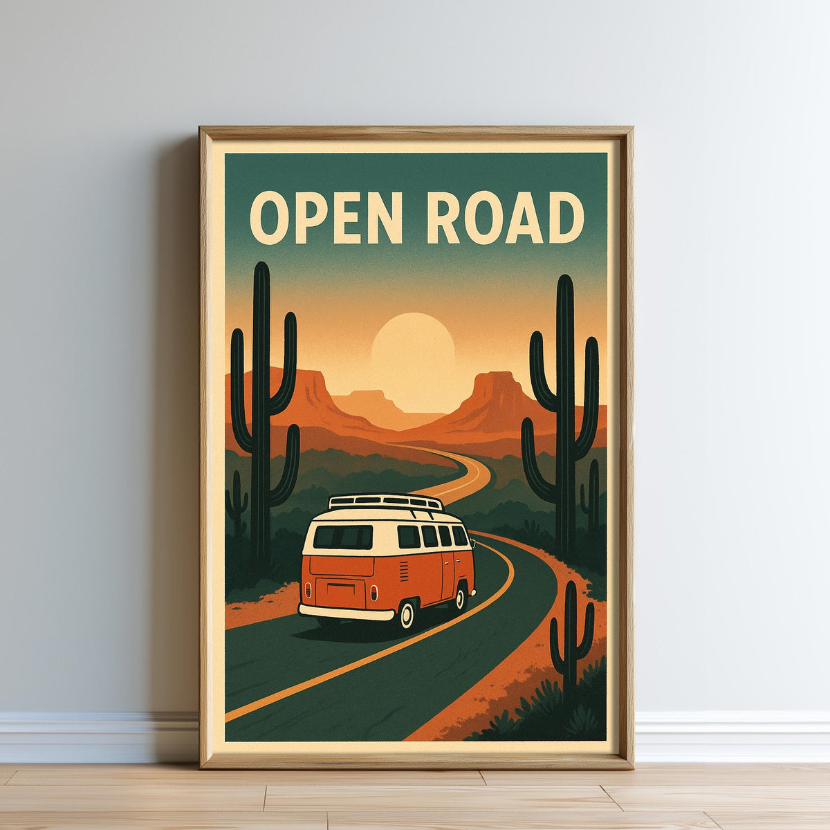 The image is a framed poster depicting a vintage-style road scene with a van driving down a winding road surrounded by desert-like scenery, including cacti and mountains.