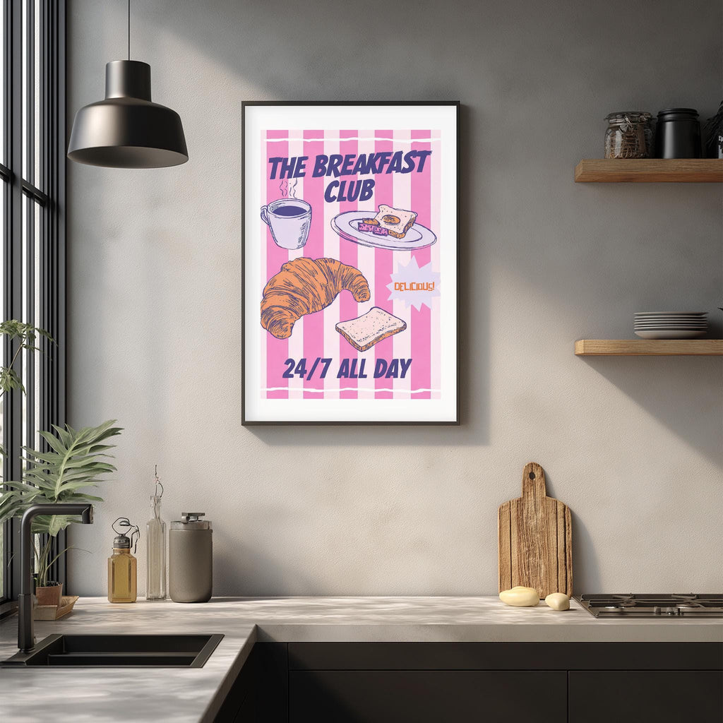 a poster for "The Breakfast Club" hanging on a wall in a kitchen.
