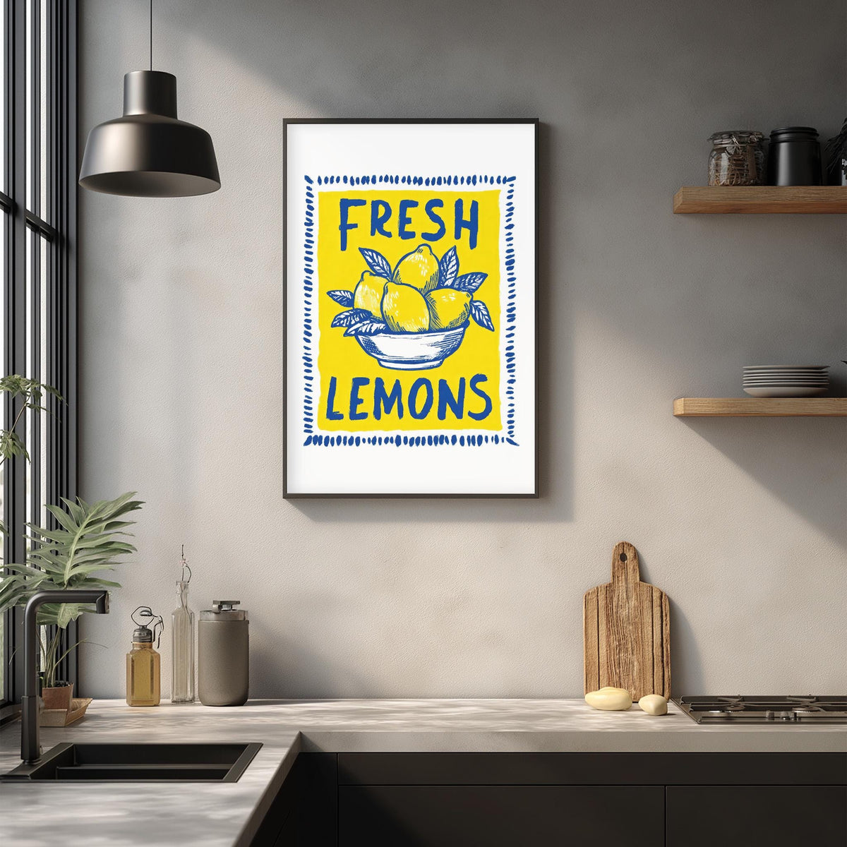 a framed poster with the text "FRESH LEMONS" and an illustration of lemons in a bowl, hanging on a wall above a kitchen counter with various kitchen items and decor.