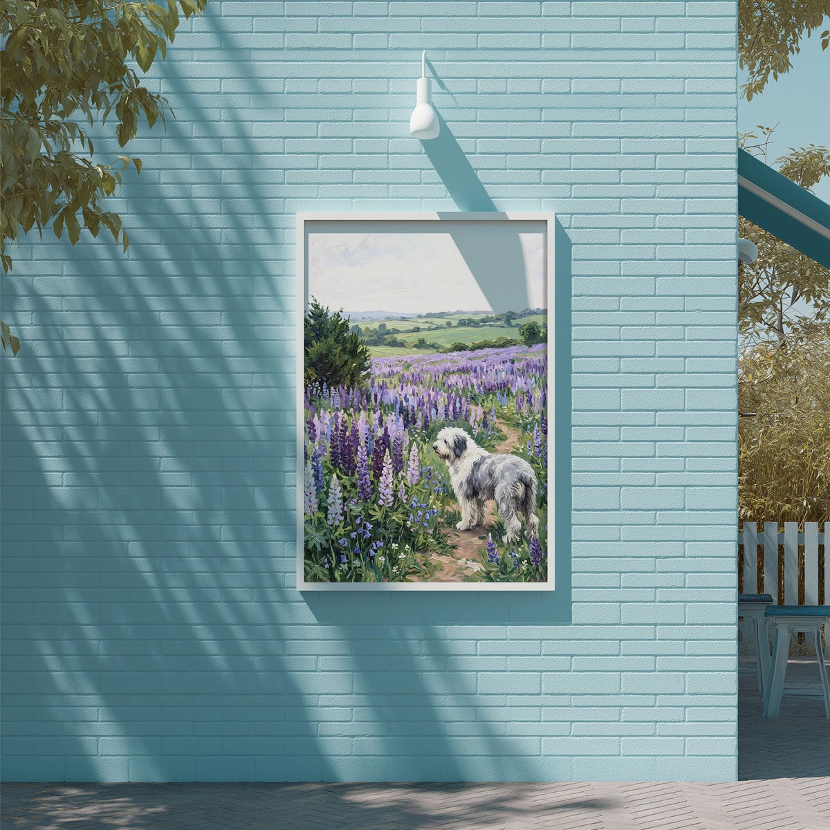 A framed painting of a dog standing in a field of purple flowers is displayed on a blue wall.