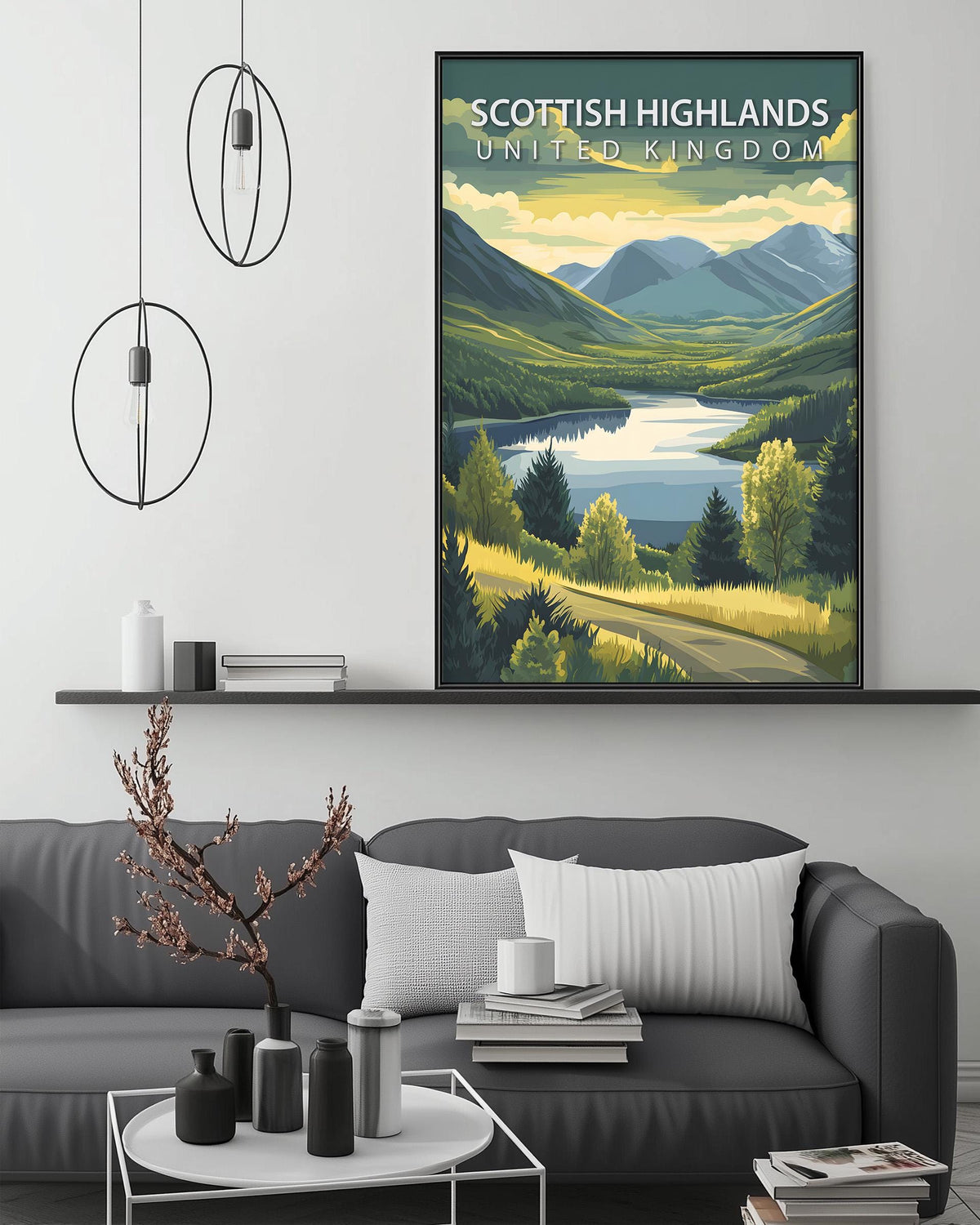 a living room with a gray sofa, a coffee table, and a large framed poster of the Scottish Highlands in the background.