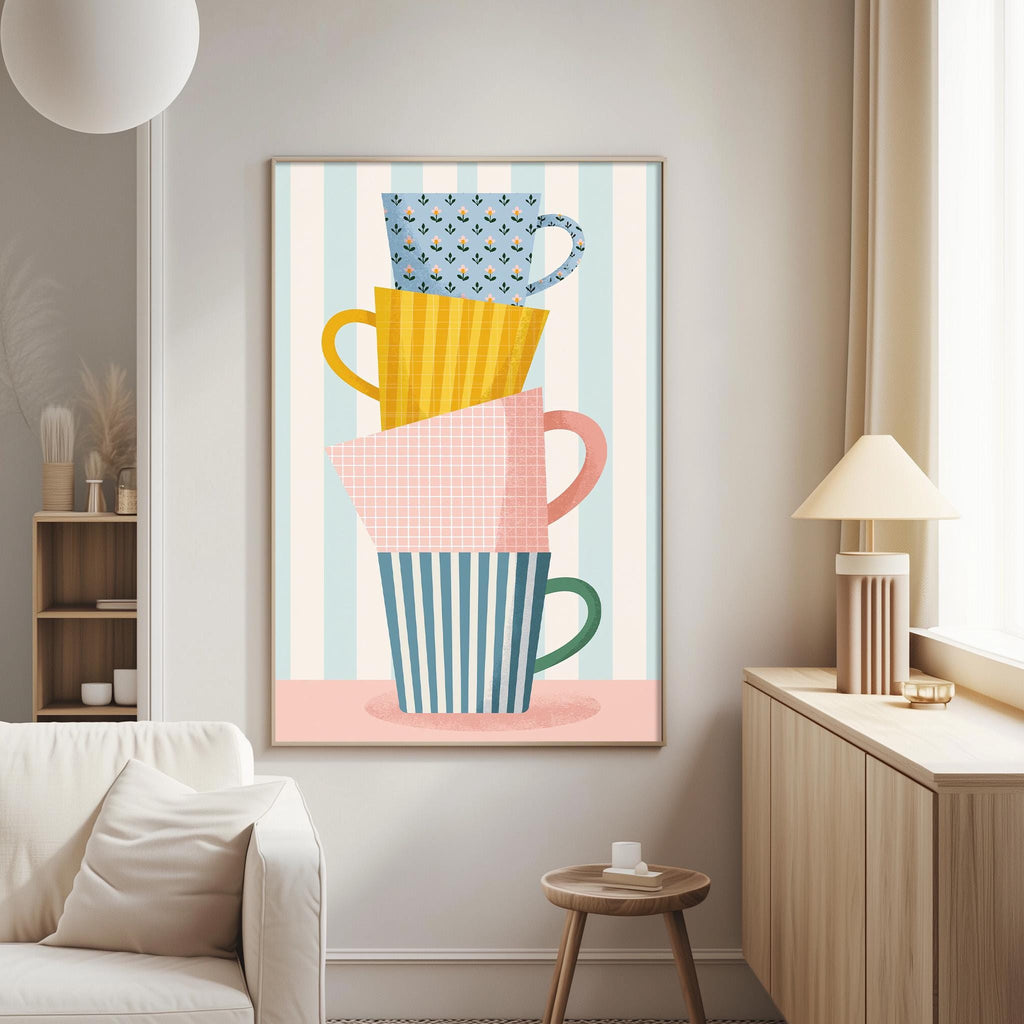 a living room with a white sofa, a wooden side table, and a framed poster of colorful mugs on the wall.