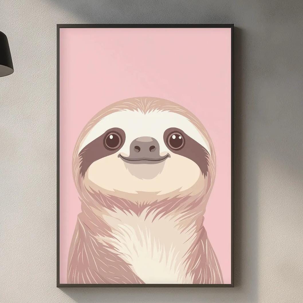 a kitchen counter with a framed illustration of a sloth hanging on the wall above it. The sloth has a pink background and a brown and white patterned face. The kitchen counter has various items on it, including a cutting board, a bottle, and a plant.