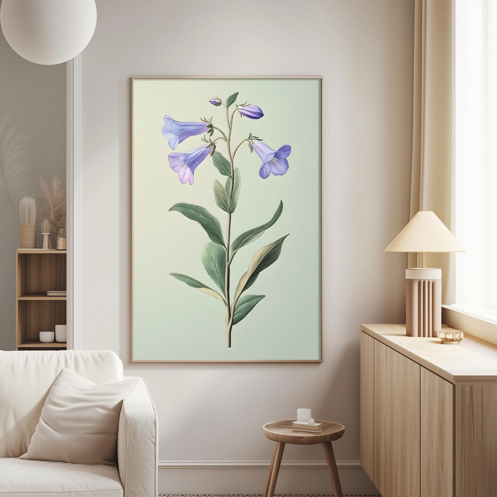 a living room with a large framed print of a purple flower on the wall, a white sofa, a wooden side table, and a lamp on a wooden cabinet.