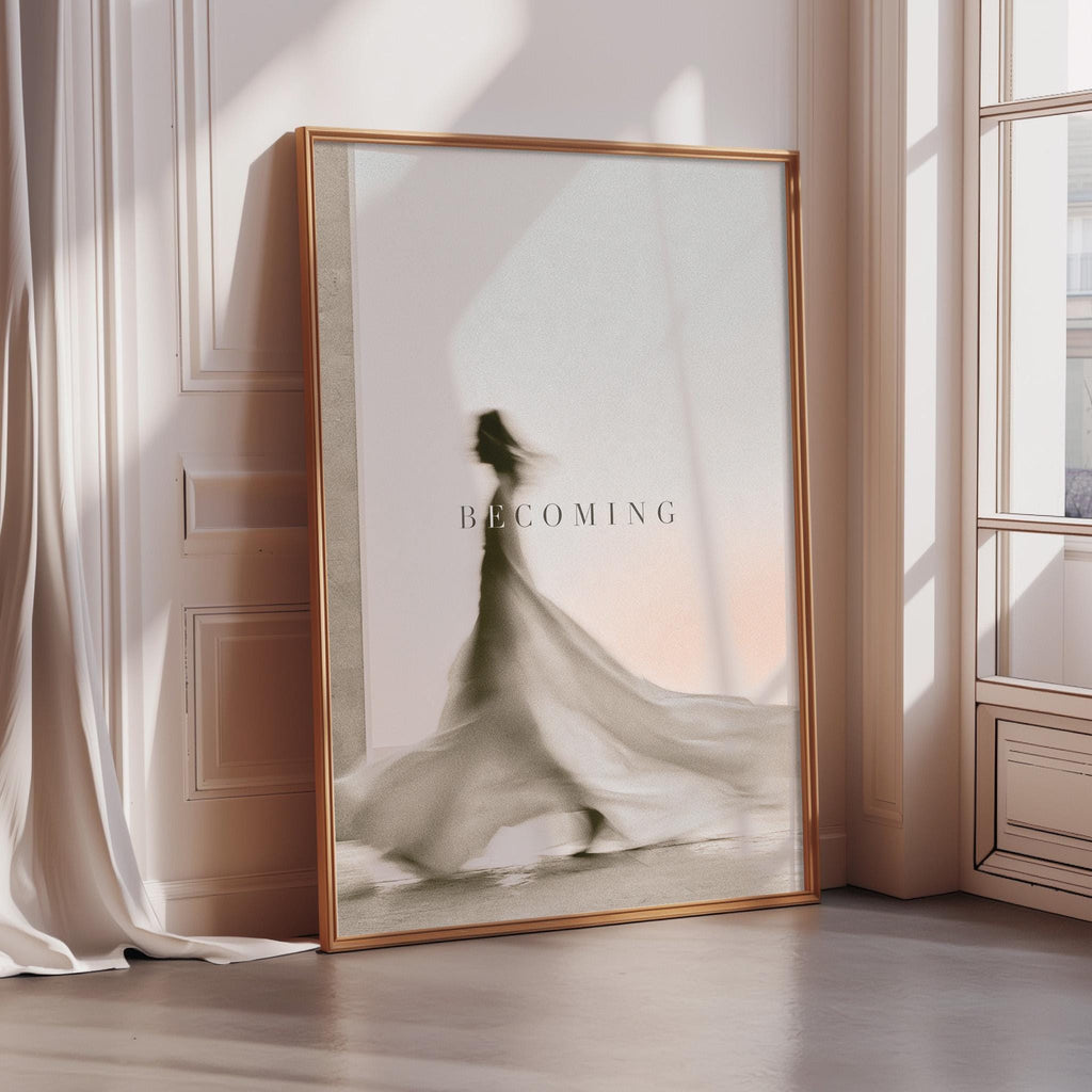 a large framed poster with a silhouette of a person in a flowing dress, standing in front of a window.
