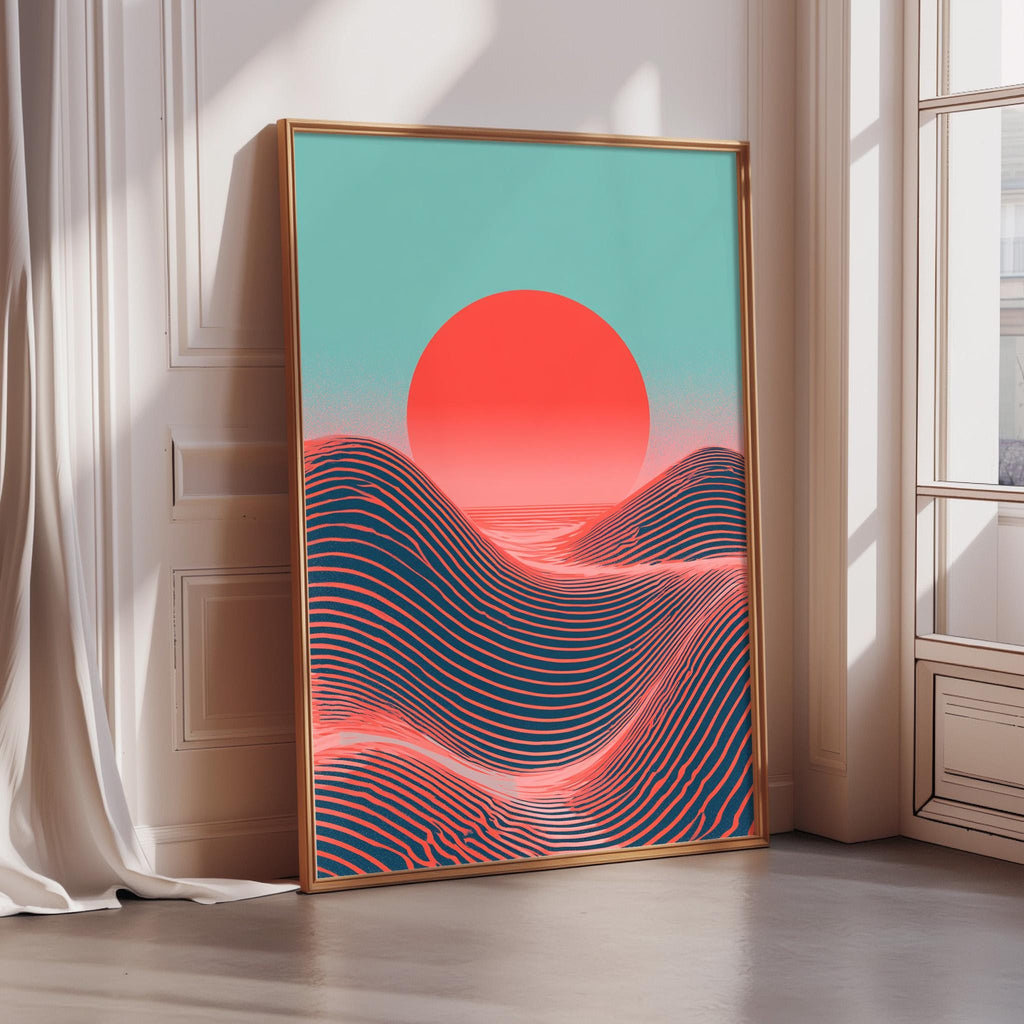 a large framed poster with a vibrant sunset scene, featuring a red sun and blue and black waves.
