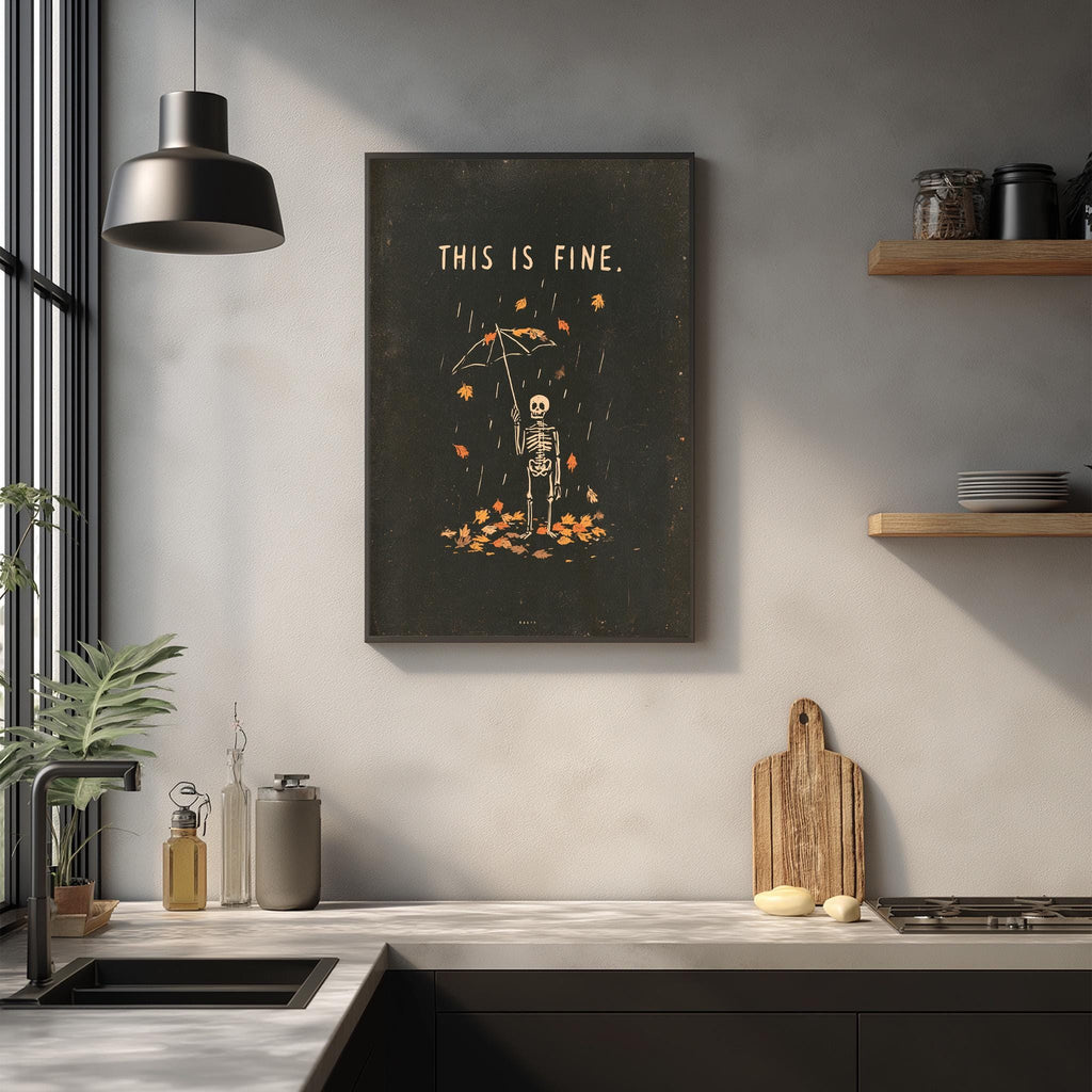 a kitchen counter with various items such as a cutting board, a bottle, and a plant. Above the counter, there is a framed poster with the text "THIS IS FINE."