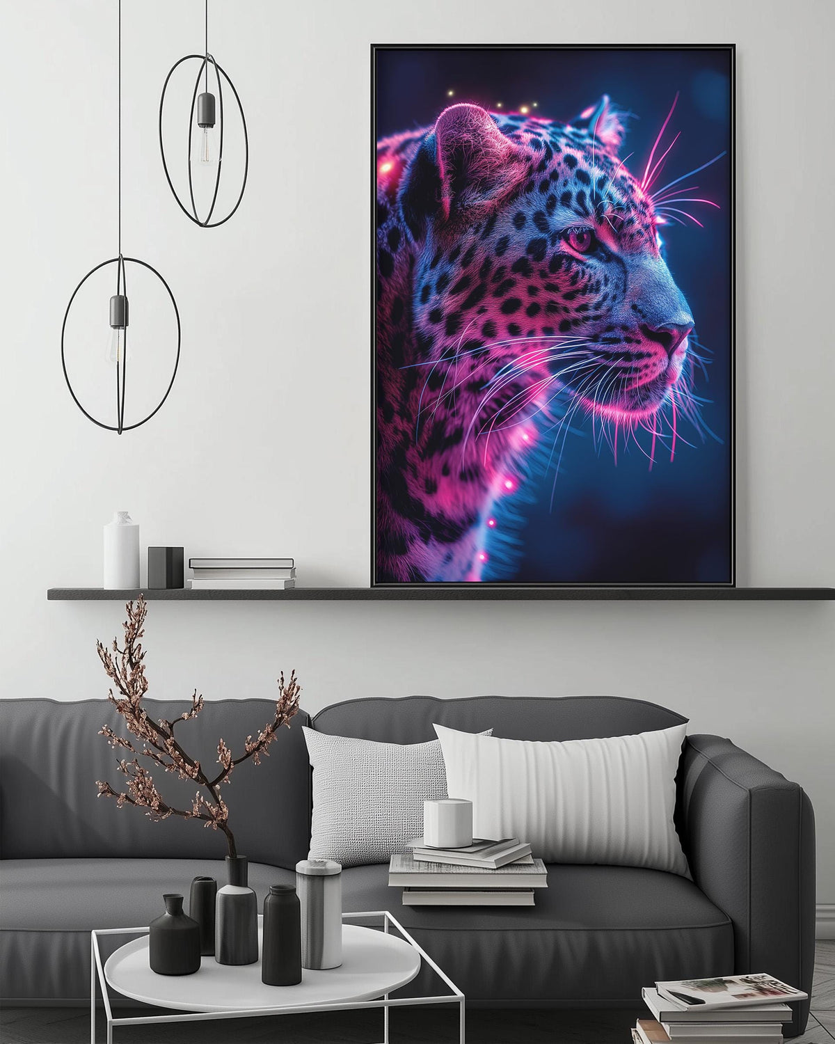 a large, vibrant poster of a leopard with a striking pink and blue color scheme, displayed on a wall above a gray couch in a modern living room setting.
