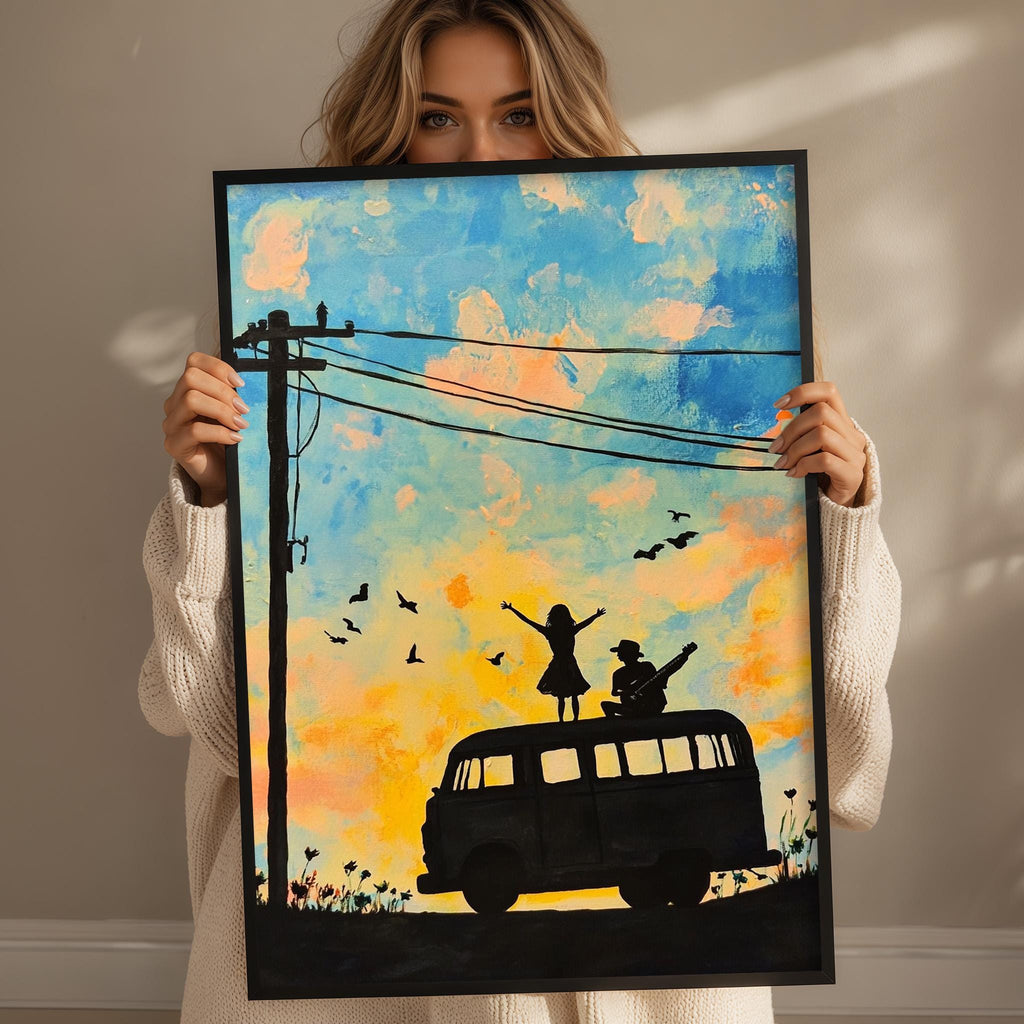A woman holds up a framed painting depicting a silhouette of a person riding a bus with a bird on top, set against a colorful sky with clouds.