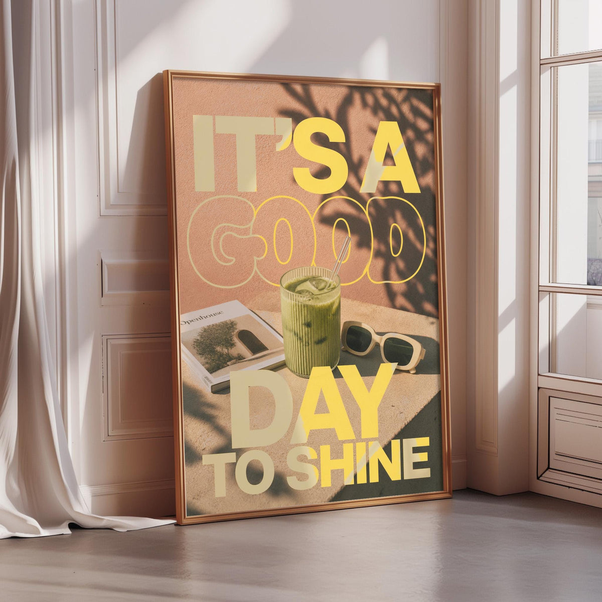 A framed poster with the text "IT'S A GOOD DAY TO SHINE" displayed prominently.