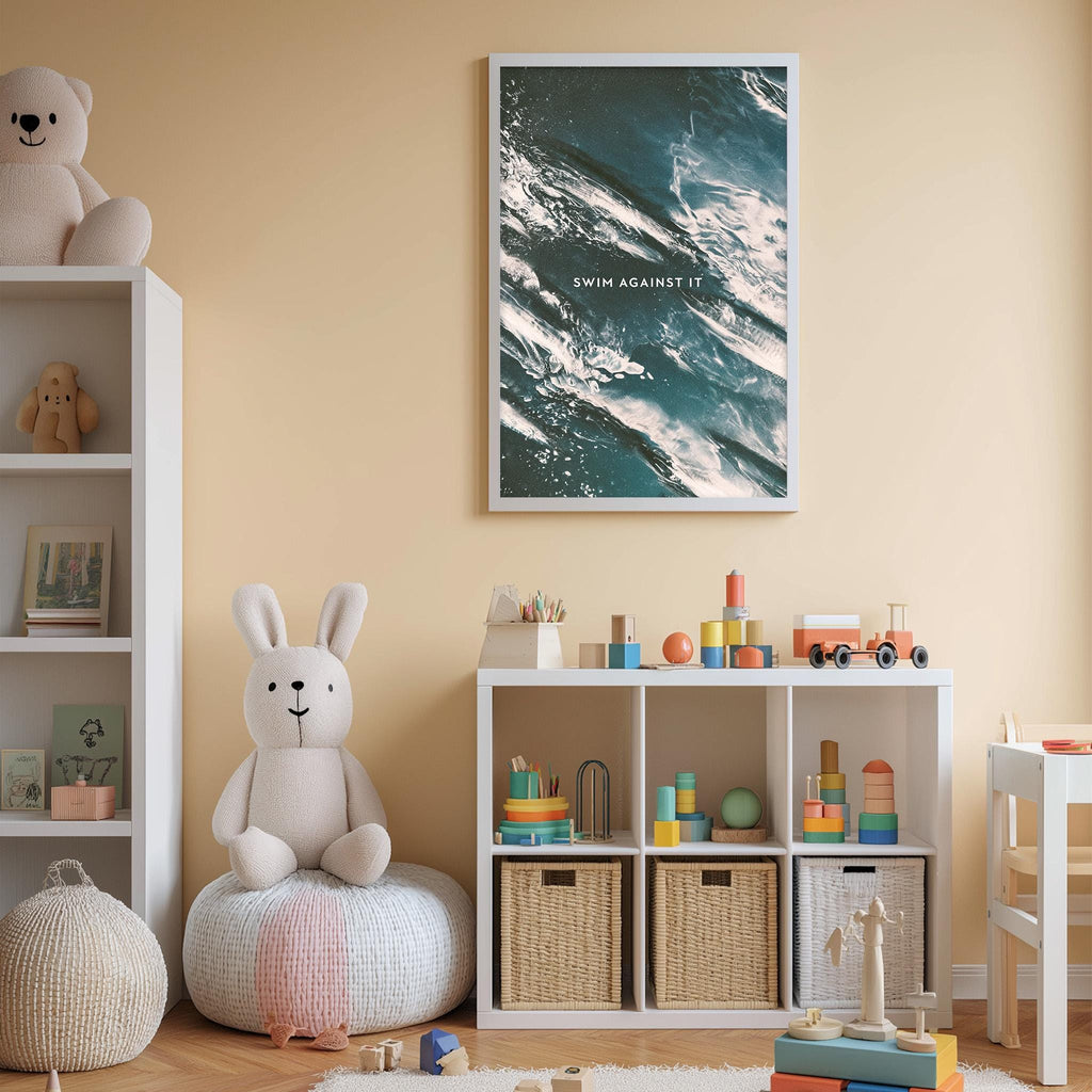 A child's bedroom with a white bookshelf, a stuffed rabbit, and a colorful toy set. The wall has a framed poster with the text "SWIM AGAINST IT".