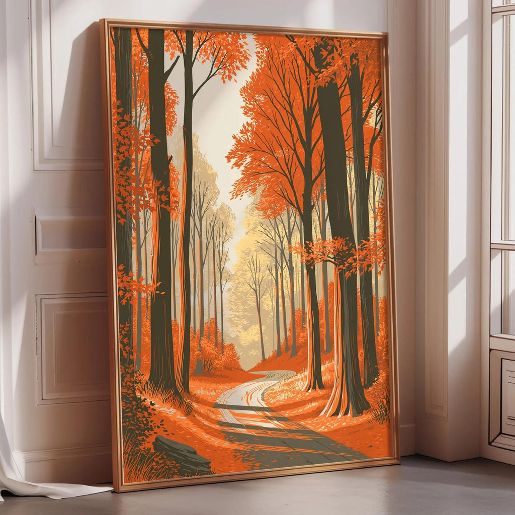 A framed painting depicting a serene forest scene with a winding path surrounded by tall trees with orange leaves.