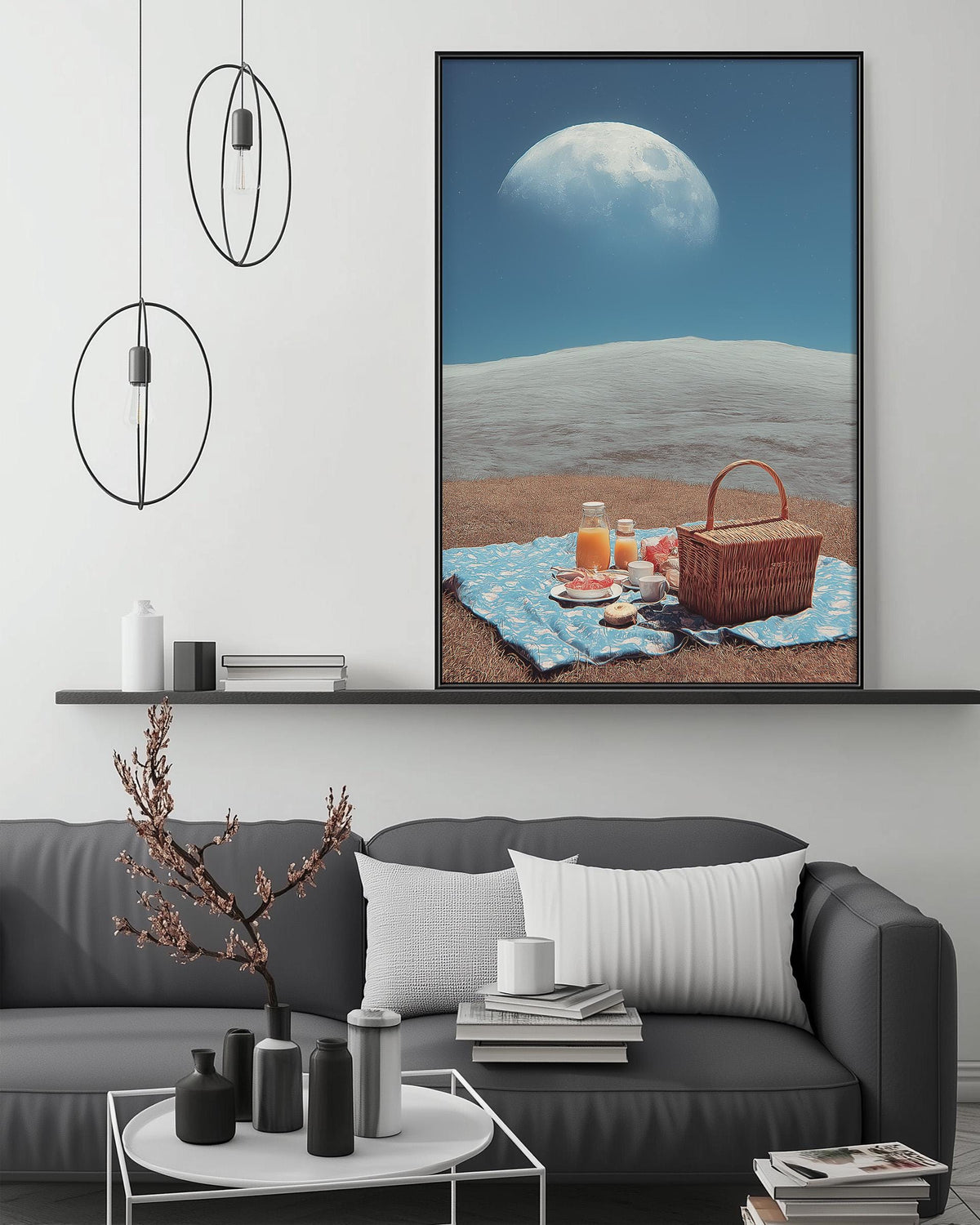 a serene beach scene with a picnic basket and a blue blanket spread out on the sand, under a large moon in the sky.