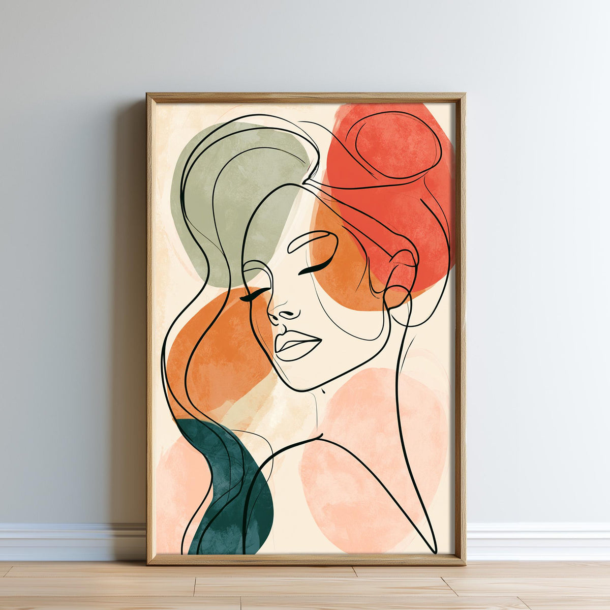 The image is a framed abstract art print depicting a stylized female face with flowing hair and a serene expression.