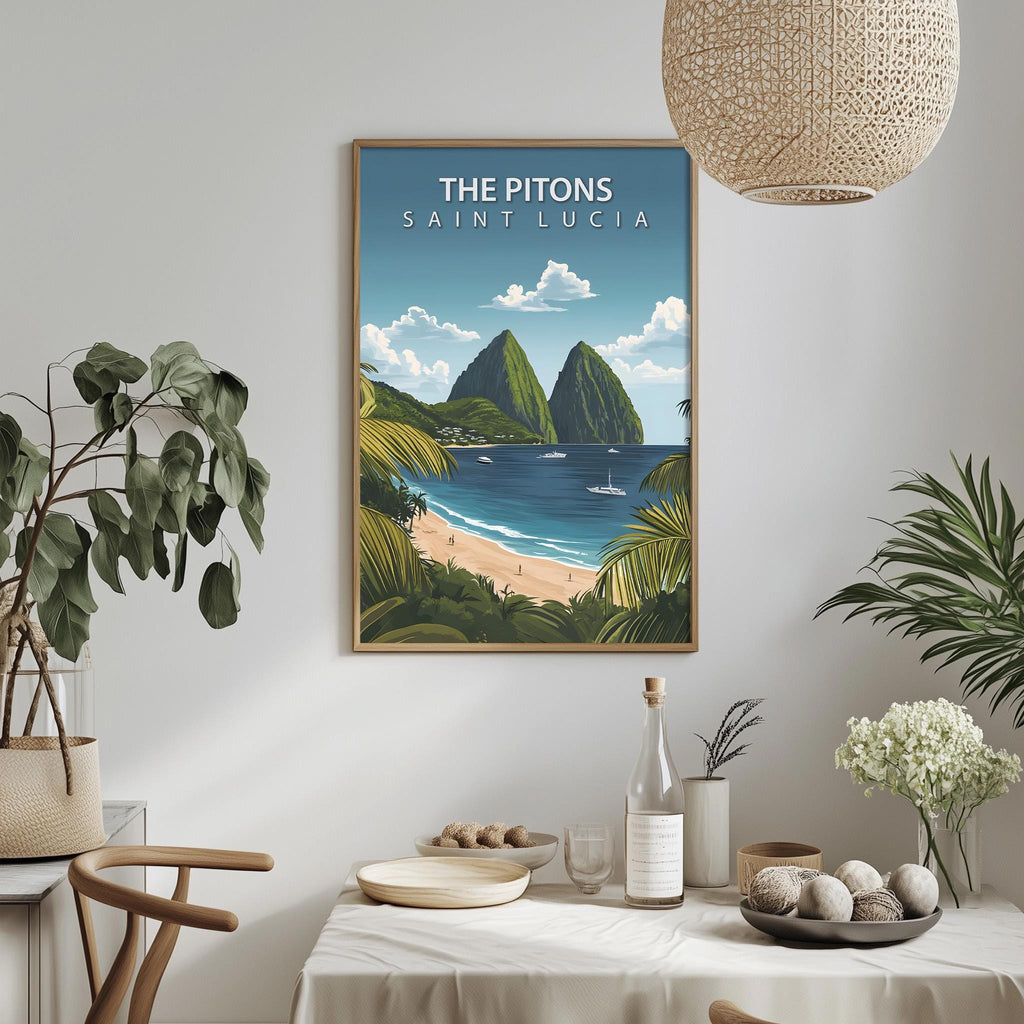 a framed poster of a tropical island landscape, with a beach, mountains, and a blue ocean, hanging on a wall above a dining table with various items on it.