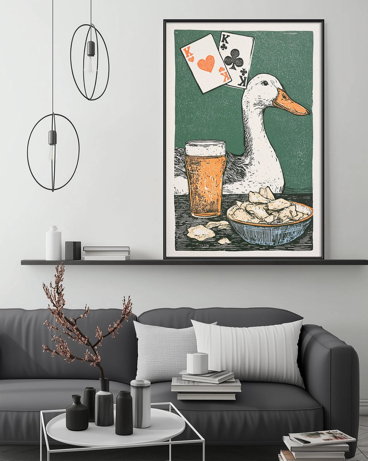 a large framed illustration of a duck with playing cards in its beak, set against a green background. The duck is surrounded by various objects, including a beer mug, a bowl of chips, and a plant. The scene appears to be a playful and whimsical depiction of a casual, leisurely moment.