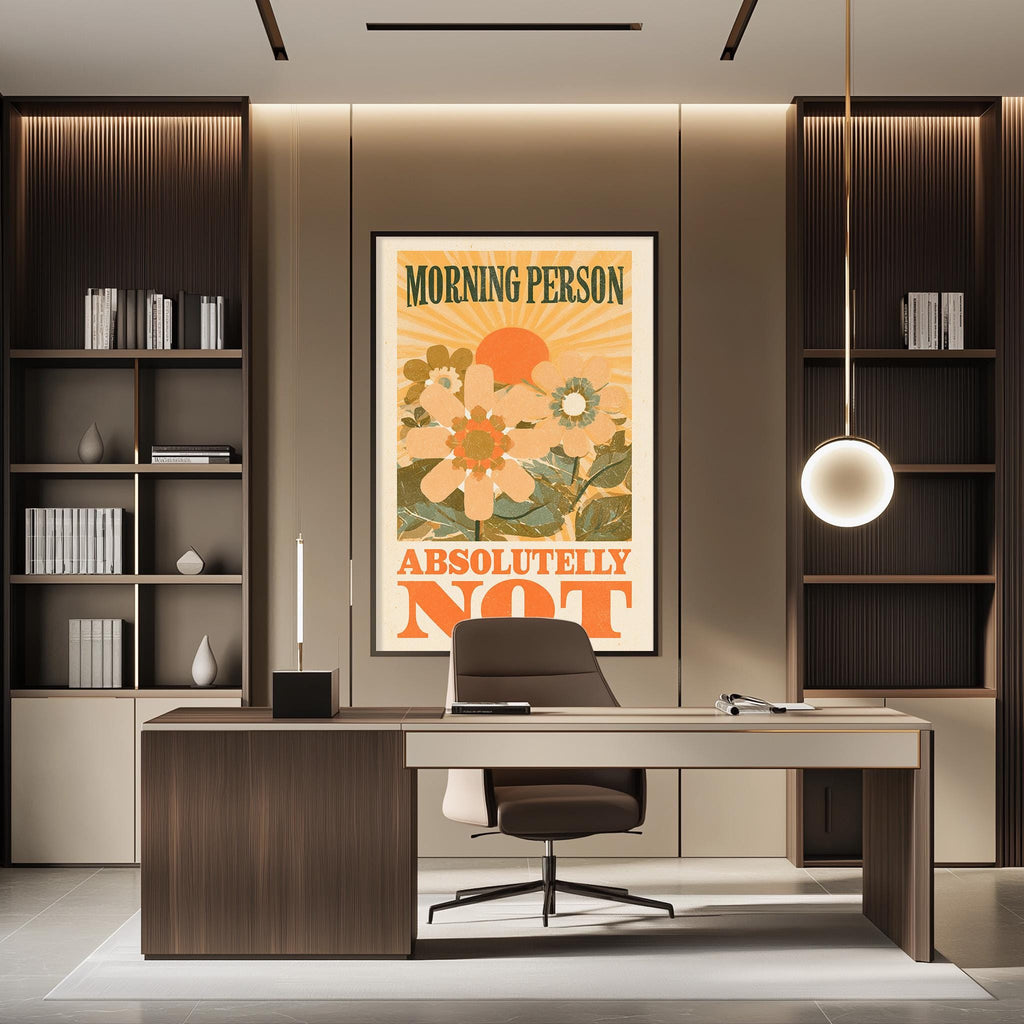 a modern office space with a large poster on the wall that reads "MORNING PERSON ABSOLUTELY NOT". The office has a wooden desk and chair, and there are bookshelves on either side of the desk. The overall design and decor of the space create a professional and stylish atmosphere.