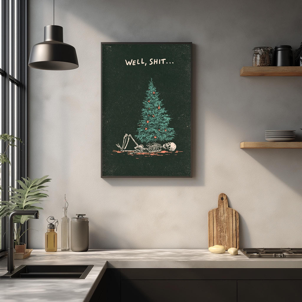 a kitchen counter with various items such as a cutting board, a bottle, and a plant. Above the counter, there is a framed poster with a skeleton lying on a Christmas tree, accompanied by the text "WELL, SHIT..."