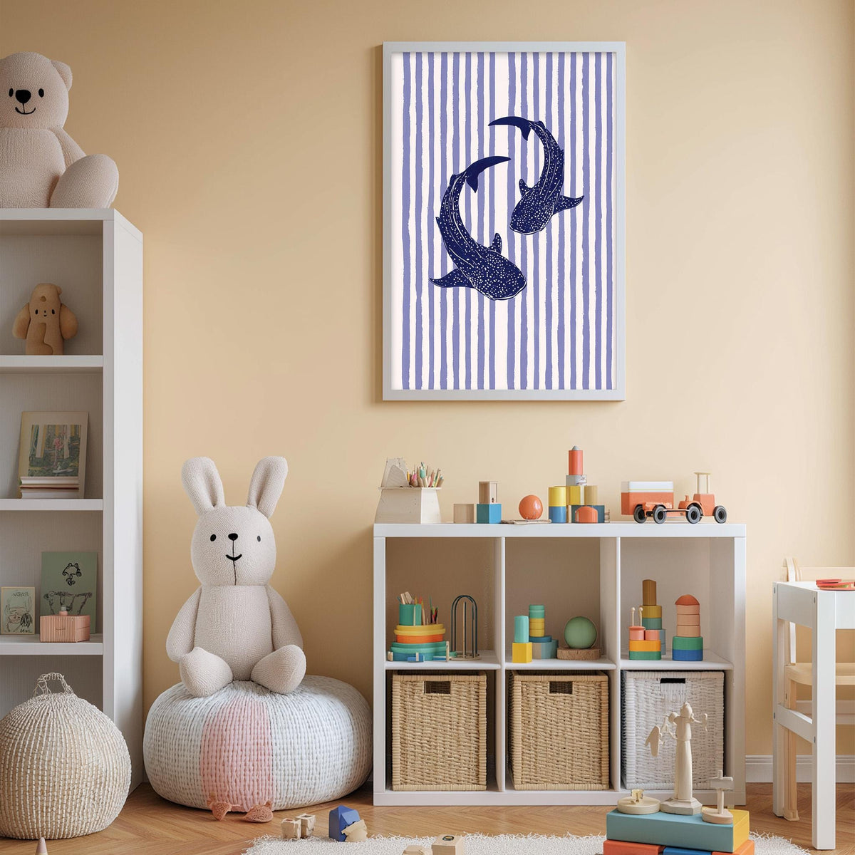 A child's bedroom with a white bookshelf, a stuffed rabbit, a toy train, and a striped fish painting on the wall.