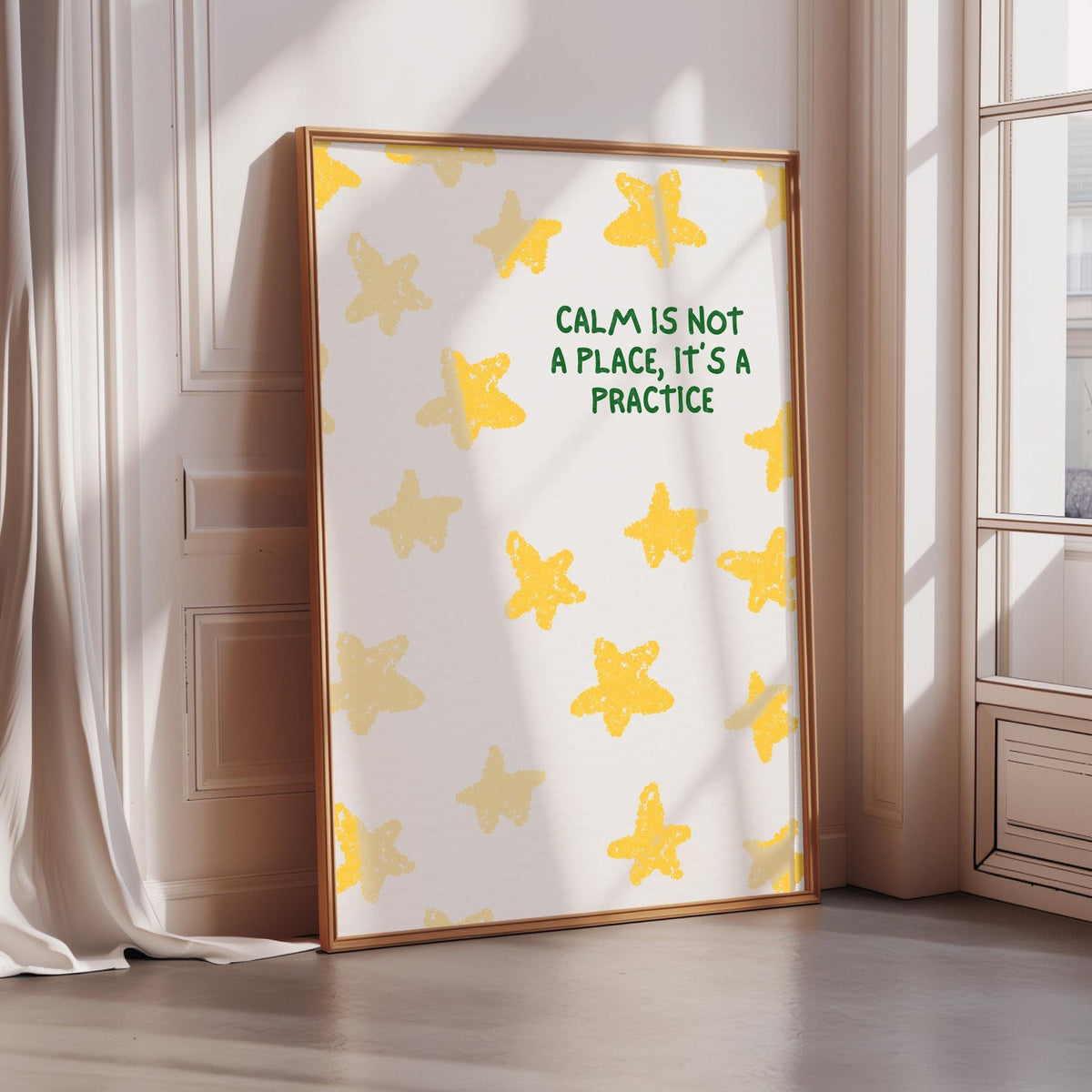 a framed poster with a white background and yellow star patterns. The poster has a motivational message that reads "Calm is not a place, it's a practice".