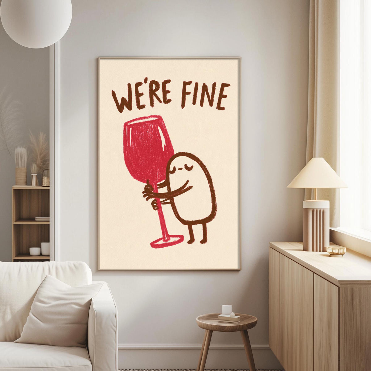 a poster with a cartoon character holding a large red wine glass, accompanied by the text "WE'RE FINE".