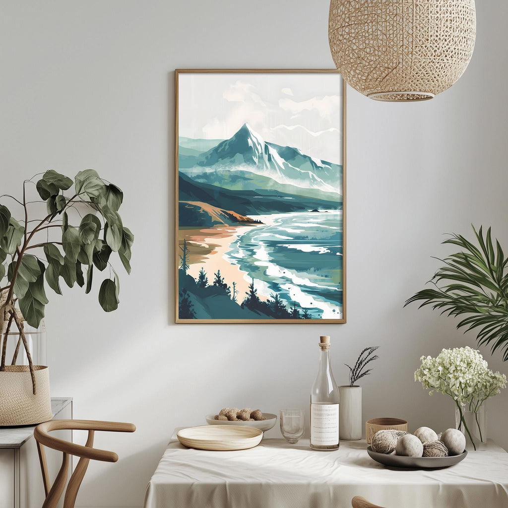 a serene landscape with a mountain range, a beach, and a body of water, all depicted in a painting. The painting is hung on a wall above a dining table, which is set with various items such as a bottle, a bowl, and a vase. The table is surrounded by chairs, creating a cozy and inviting atmosphere. The overall scene conveys a sense of tranquility and natural beauty.