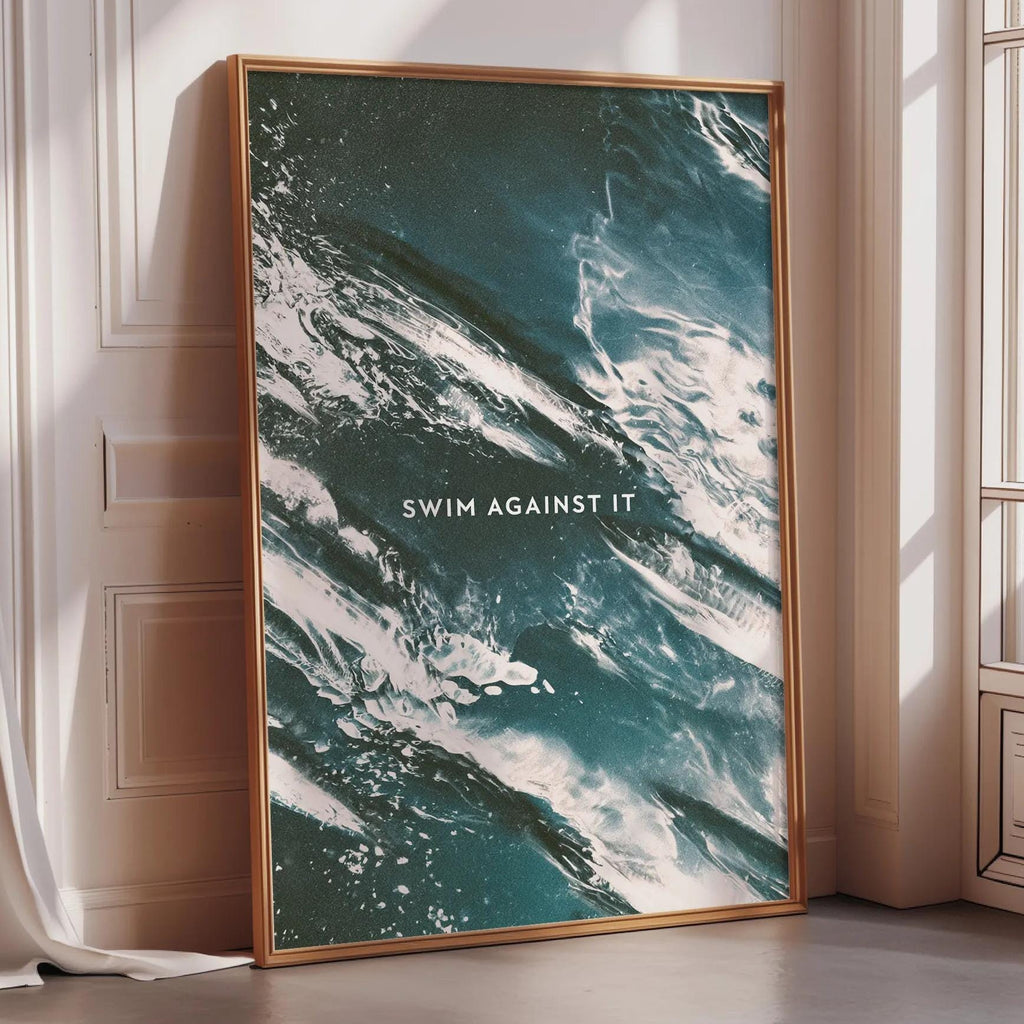 a large framed poster with a striking abstract design of swirling, teal-colored waves.